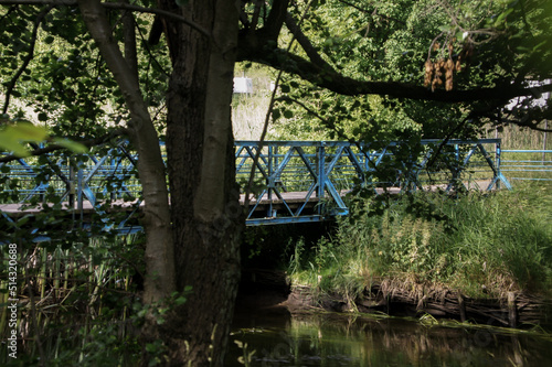 Zdjęcie mostu łączącego dwa parki obok siebie. Starogard Gdański, Poland AfterFotoJpg 