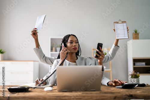 Multitasking Businesswoman In Office