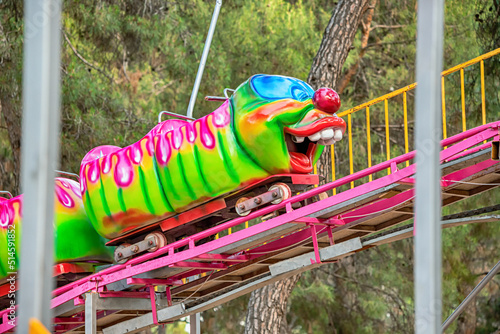 A strange and frightening attraction in an outdoor circus and amusement park. Cringe and creepy funfair