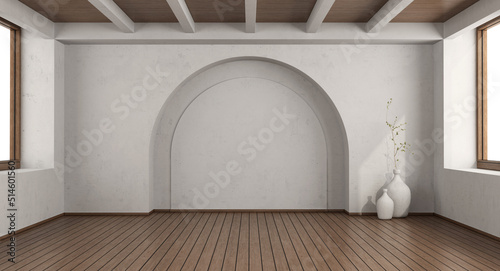Empty white room with arch wall