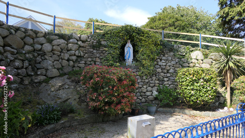 Statue of Virgin Mary Lourdes France Basilica grotto in Carlingford Village and Lough County Louth on Irish Sea