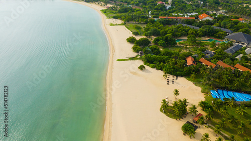 Aerial drone of Beautiful tropical beach and blue sea. Pasikuda Beach, Sri Lanka.