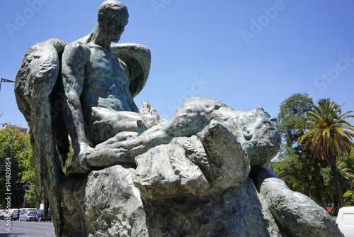 bronze statue at the entrance of the catholic university in santiago (chile): named "unidos en la gloria y en la muerte" (united in glory and death)