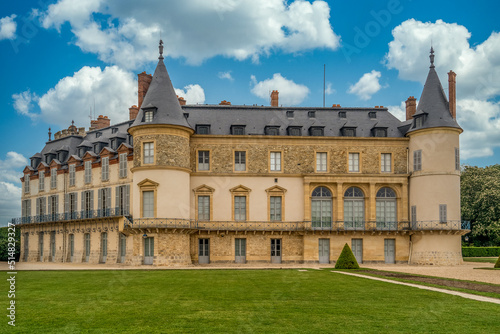 View of Château de Rambouillet, location for several international summits with two circular towers and manicured gardens in France