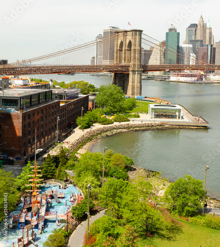 Aerial view of Brooklyn Bridge park with the bridge and Manhattan in the distance