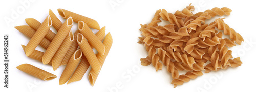 Wolegrain penne and fusilli pasta from durum wheat isolated on white background. Top view. Flat lay,
