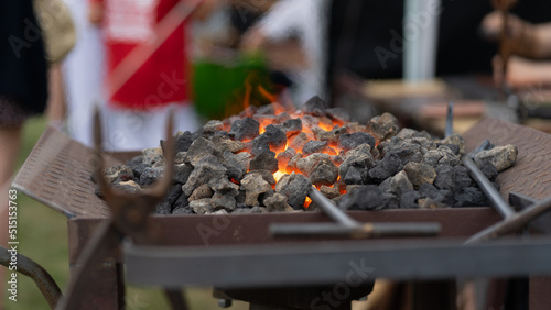 Red-hot coals in fire