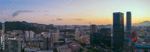 an aerial panorama on sunrise cityscape in downtown shenzhen, china