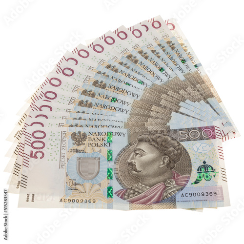 pięćset polskich nowych złotych w nowych banknotach na białym tle
