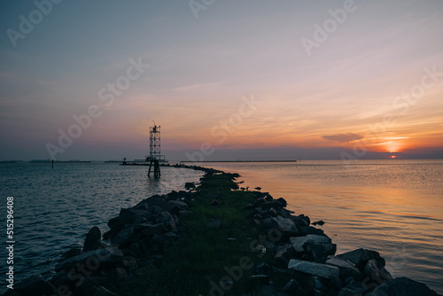 Colorful sunset over the pier on the oceanside in Cape Charles, Virginia