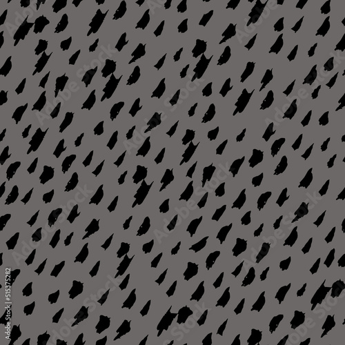 Hand drawn dots seamless pattern. Abstract black paint spots, dashes, lines on grey background