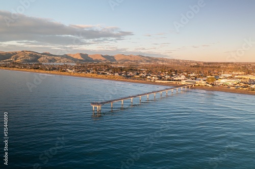 Aerial drone shot during sunrise at New Brighton beach, Christchurch, South Island, New Zealand