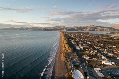 Aerial drone shot during sunrise at New Brighton beach, Christchurch, South Island, New Zealand