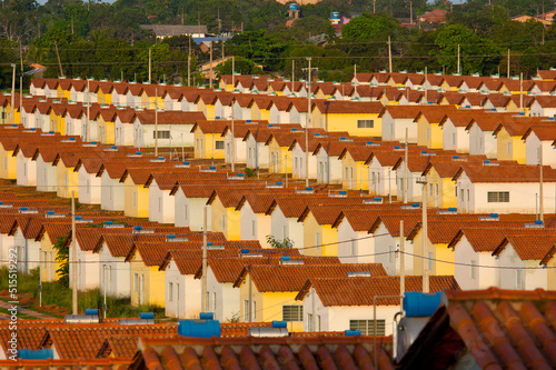 neighborhood with many identical popular houses