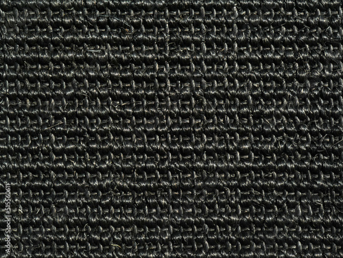 Close up view of Sisal carpet, woven natural fibers, for texture and background.