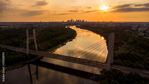 Południowa część miasta Warszawa - Zachód słońca z mostem Siekierowskim 