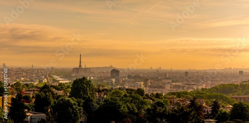 Beautiful view of the Paris under the sunset lights in France