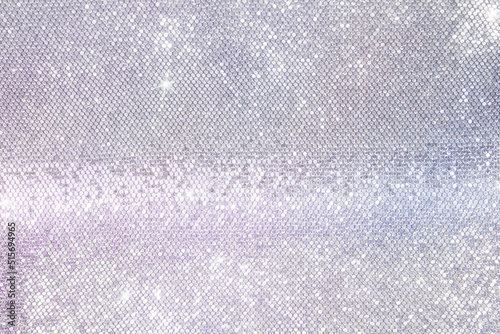 mother-of-pearl background of silver sequins, iridescent silver background