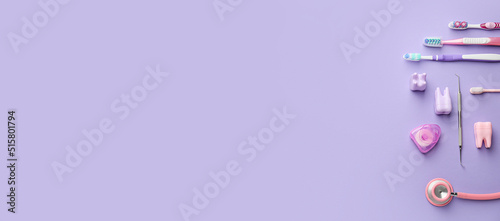 Set for oral hygiene on lilac background with space for text