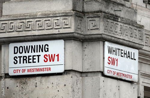 Street name signs at the junction of Downing Street and Whitehall in London, SW1. 