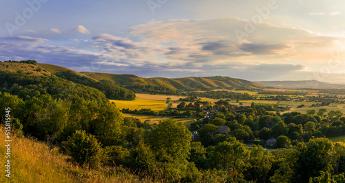 Beautiful views west over the village of Poynings from Devils Dyke to Chanctonbury ring on the south downs in west Sussex south east England UK