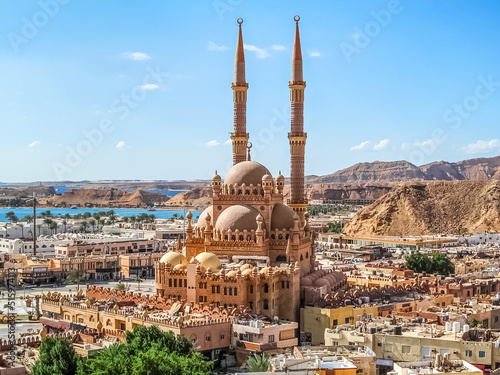 Top view of the Old Market and Al Sahaba Mosque in Sharm El Sheikh, Egypt. Aerial panorama of an Egyptian resort town with the Red Sea on the horizon