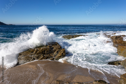 A view on the ocean with the rocks and waves