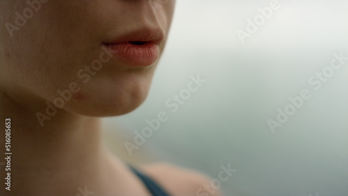 Unknown girl inhaling exhaling practicing yoga meditation on nature close up.