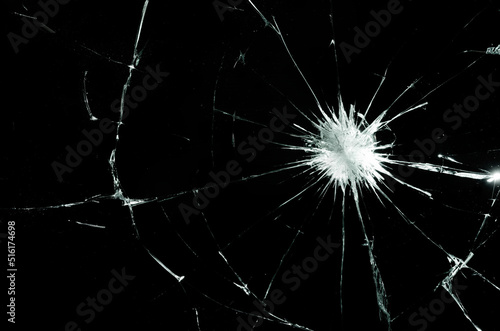 Texture cracks on Laminated glass, Tempered Safe Glass, broken abstract glass hole destruction concept.