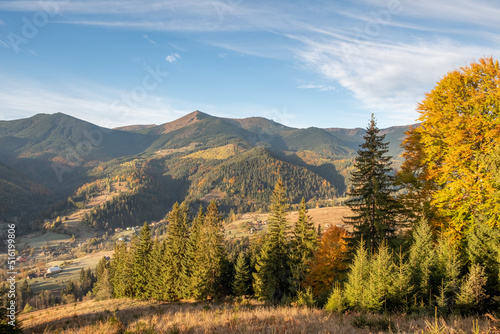 Amazing summer sunrise in Carpathian mountains. Colorful morning scene with first sunlight glowing hills and valleys