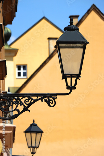 Colorful historical buildings and vintage street lantern in central Zagreb, Croatia.