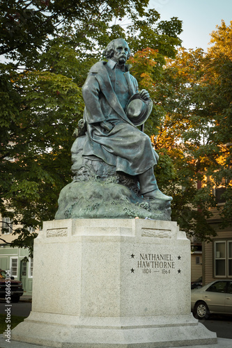 bronze statue of Nathaniel Hawthorne, American writer and novelist at the city park of Salem, Mass