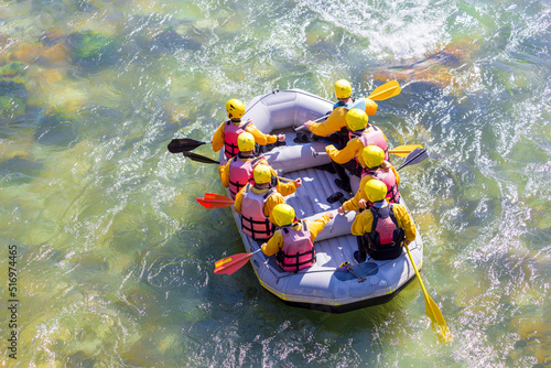 rafting boat with people top view in arahthos river greece