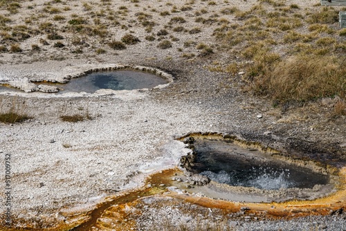 High angle shotxx of geysers and hot springs in Yellowstone National Park