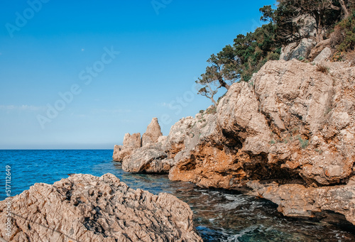 Bizarre granite rock and azure bay in Capo Testa, Sardinia, Italy.