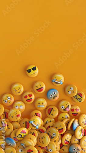 Vertical shot of a bunch of emojis with faces representing different emotions. 3d rendering.