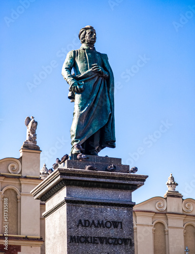 Adam Mickiewicz Monument in Krakow, Poland. Blue sky.