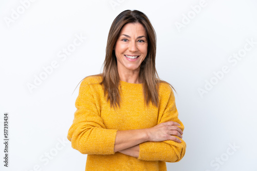 Middle age caucasian woman isolated on white background keeping the arms crossed in frontal position