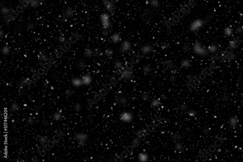 falling snow on black background