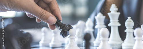 Business woman playing chess, Proactive business planning and marketing strategy just like playing chess, Business competition and success or leadership, Planning and strategies for victory concept.