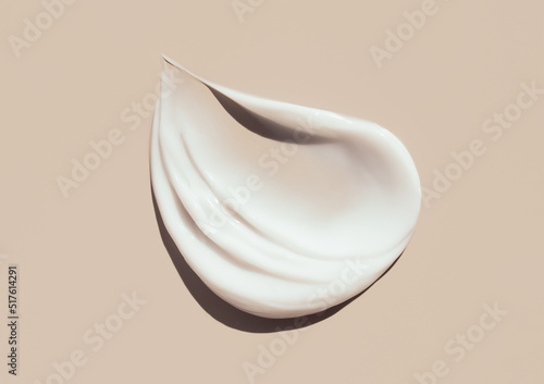 cosmetic smears cream texture on pastel background 