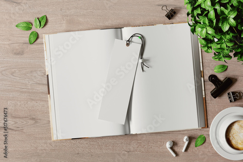 Open book with a bookmark on the table mockup. 3D rendering