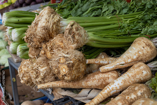 Celery and horseradish roots on a stall in a market in Haifa in Israel