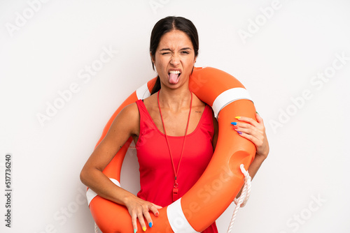 hispanic pretty woman feeling disgusted and irritated and tongue out. lifeguard concept