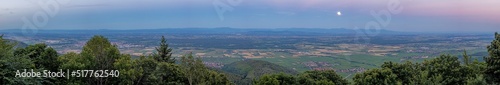 Panoramic view over the Rhine valley in Alsace with rising full moon
