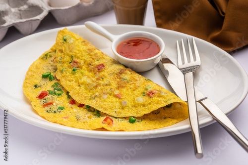 Indian Spiced Masala Omelet filled with fresh vegetable, healthy meal