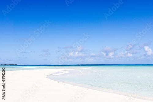 Sunny tropical Caribbean beach and turquoise water, island vacation, hot summer day