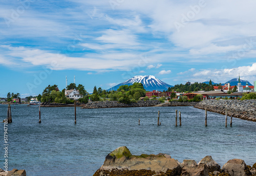 Extinct volcano of Mount Edgecumbe rises above the harbor town of Sitka in Alaska