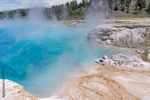 The bright blue pool of Excelsior Geyser at the Midway Geyser Basin in Yellowstone National Park.