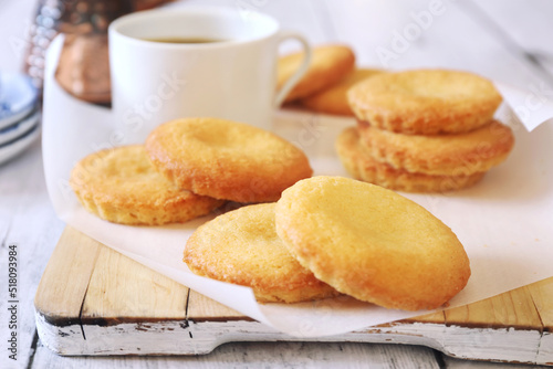 Homemade palets bretons. Salty shortbread Breton cookies and cup of coffee